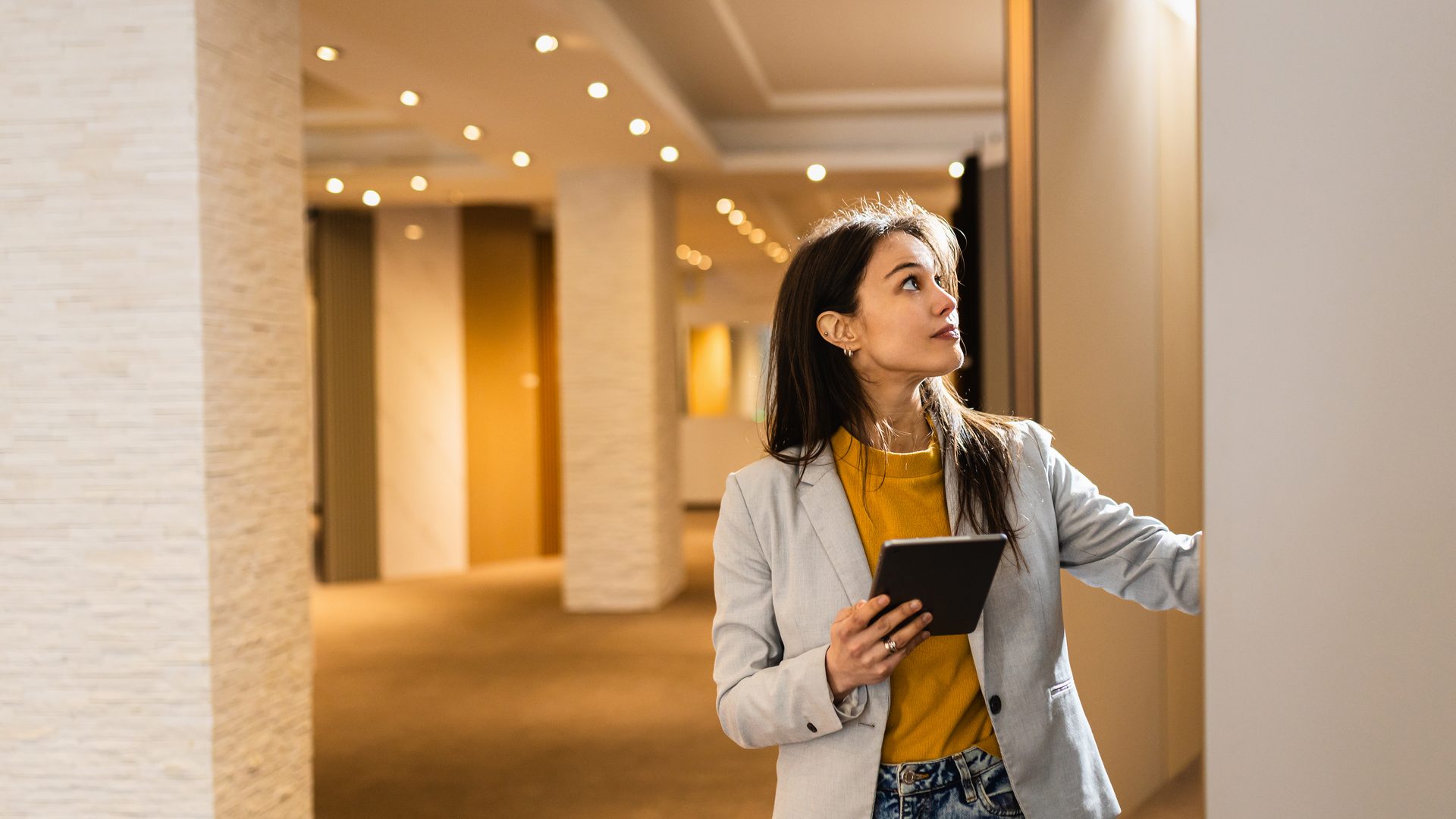Owner or facilities manager reviewing post-construction conditions